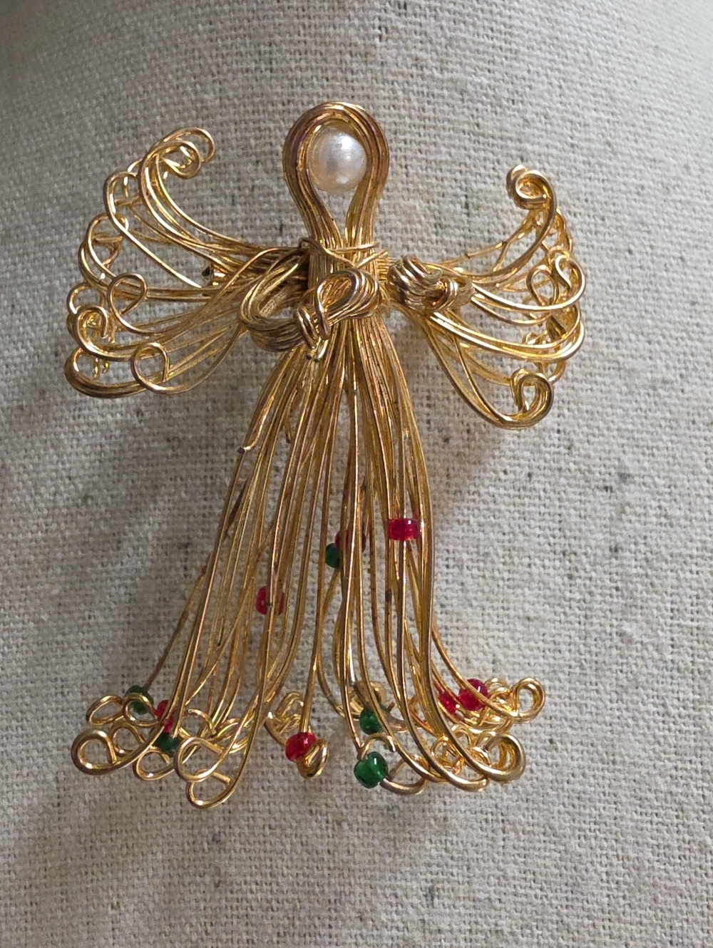 Gold Wire Angel Brooch with Pearl Head and Red & Green Accents